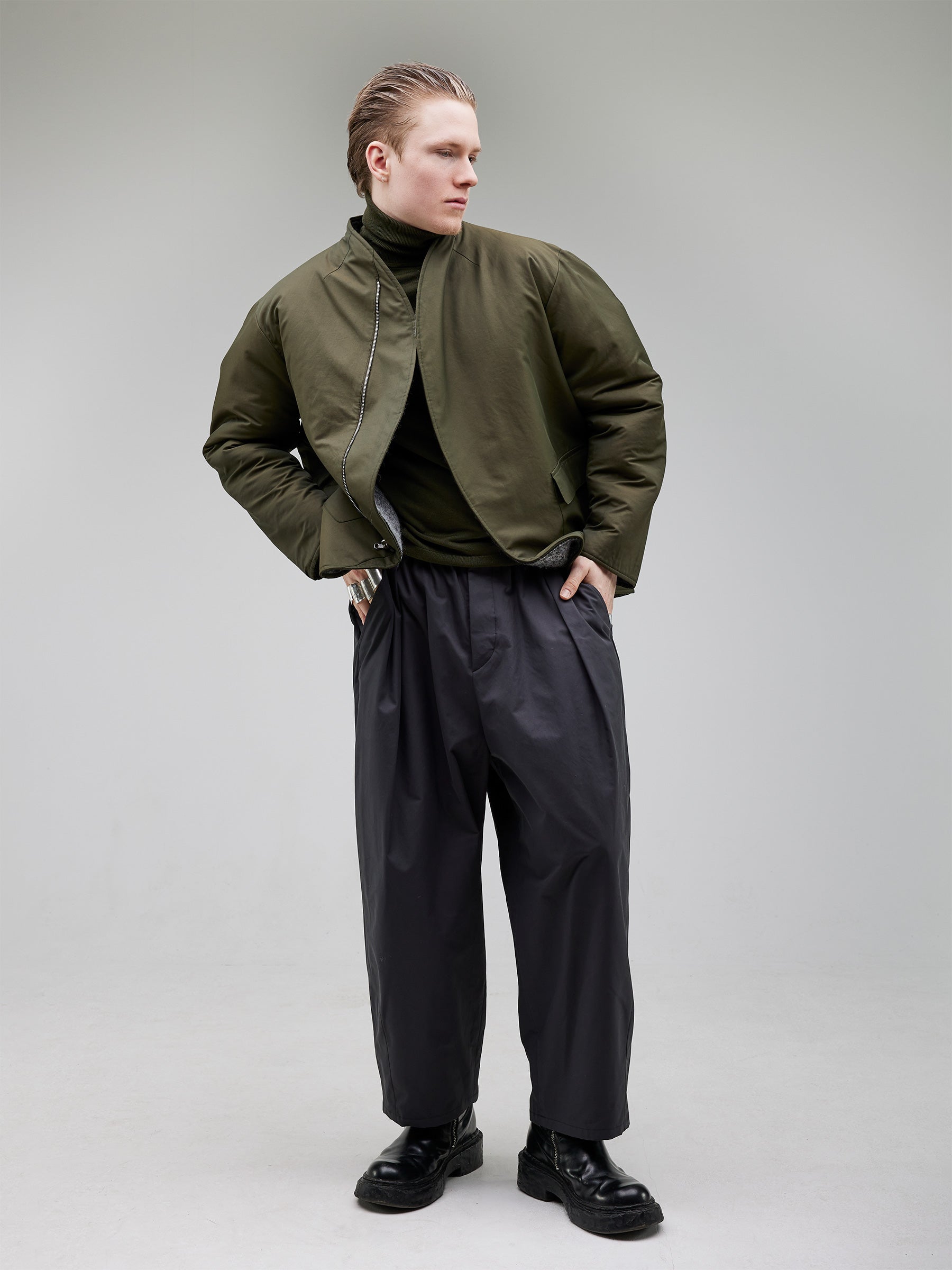 Reversed variation of Look 1, highlighting the army green gabardine side of the reversible jacket.