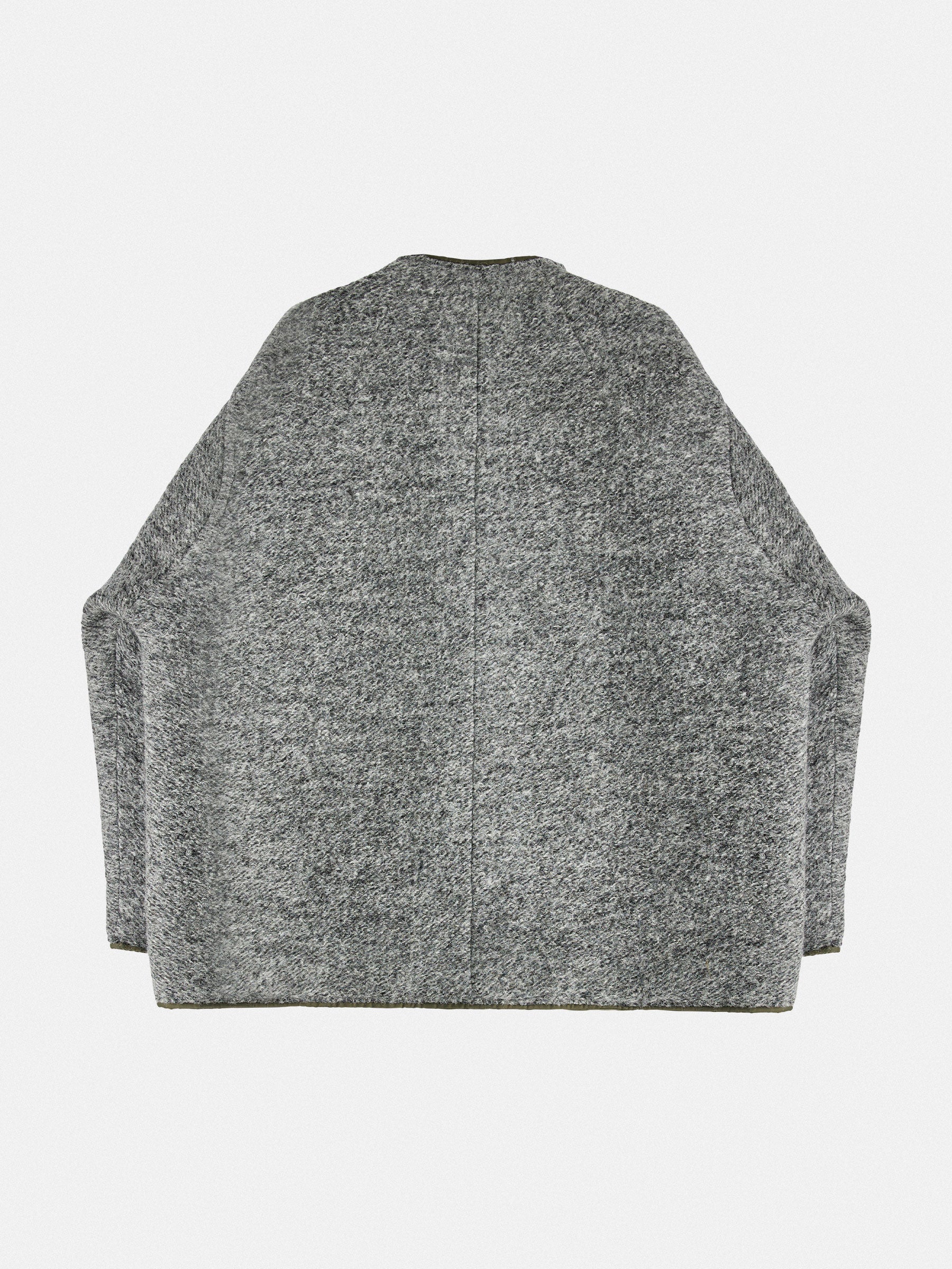 Rear view of reversible coat Autumn / Winter 2025 Puffer Jacket by Gabriel Stunz