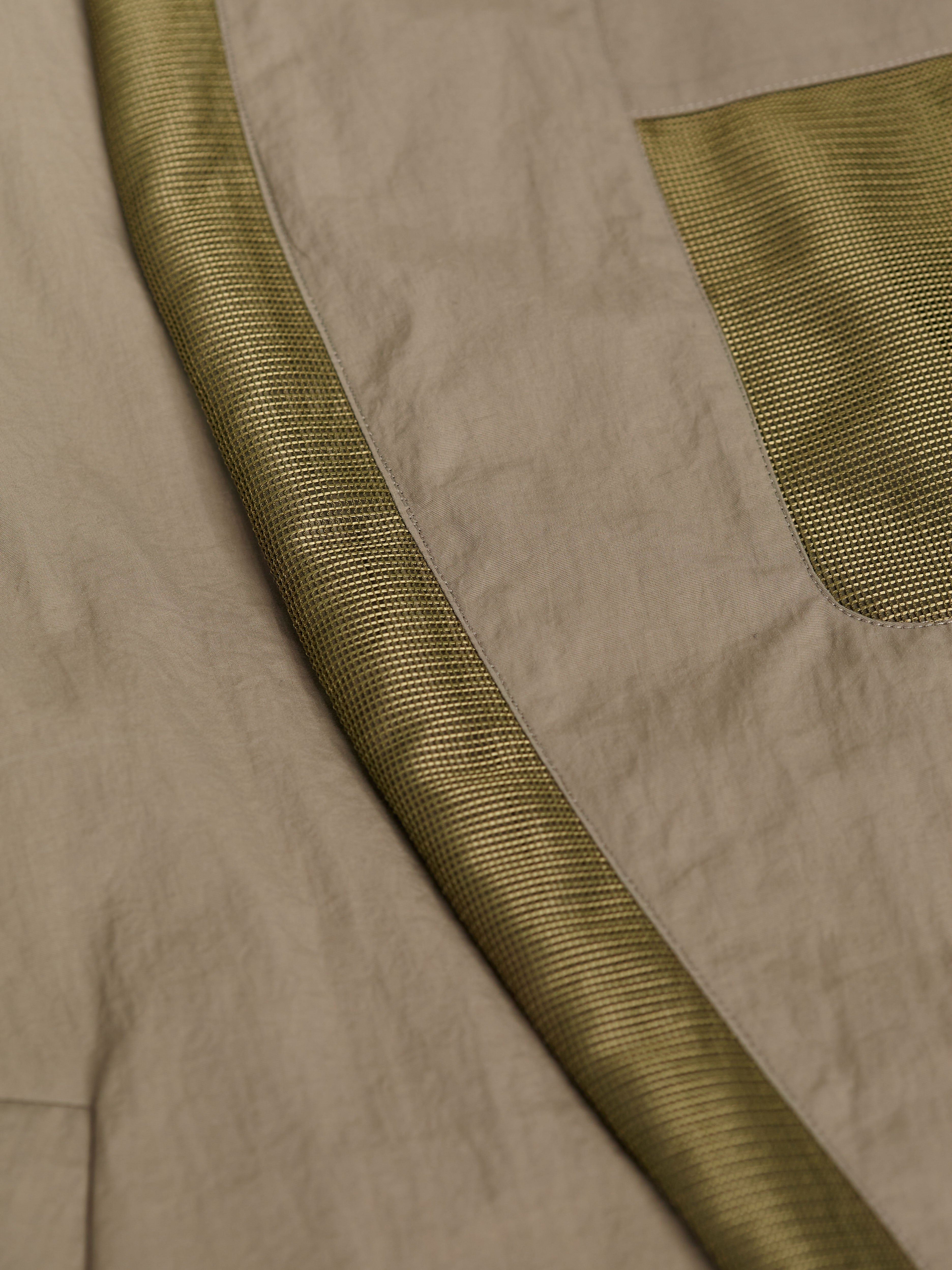 mesh detail on Autumn / Winter 2025 Puffer Jacket by Gabriel Stunz