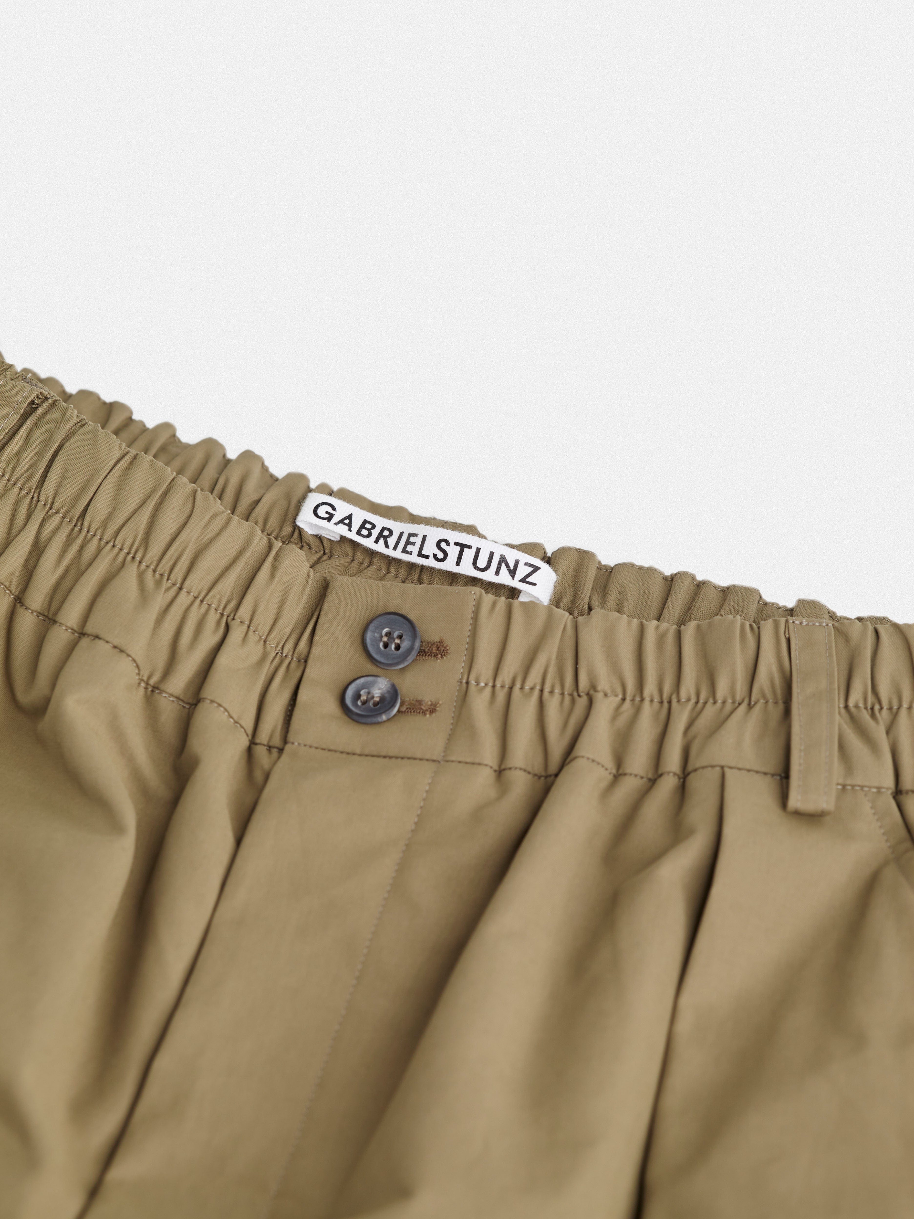 adaptive waistband detail on pant Autumn / Winter 2025 Puffer Jacket by Gabriel Stunz