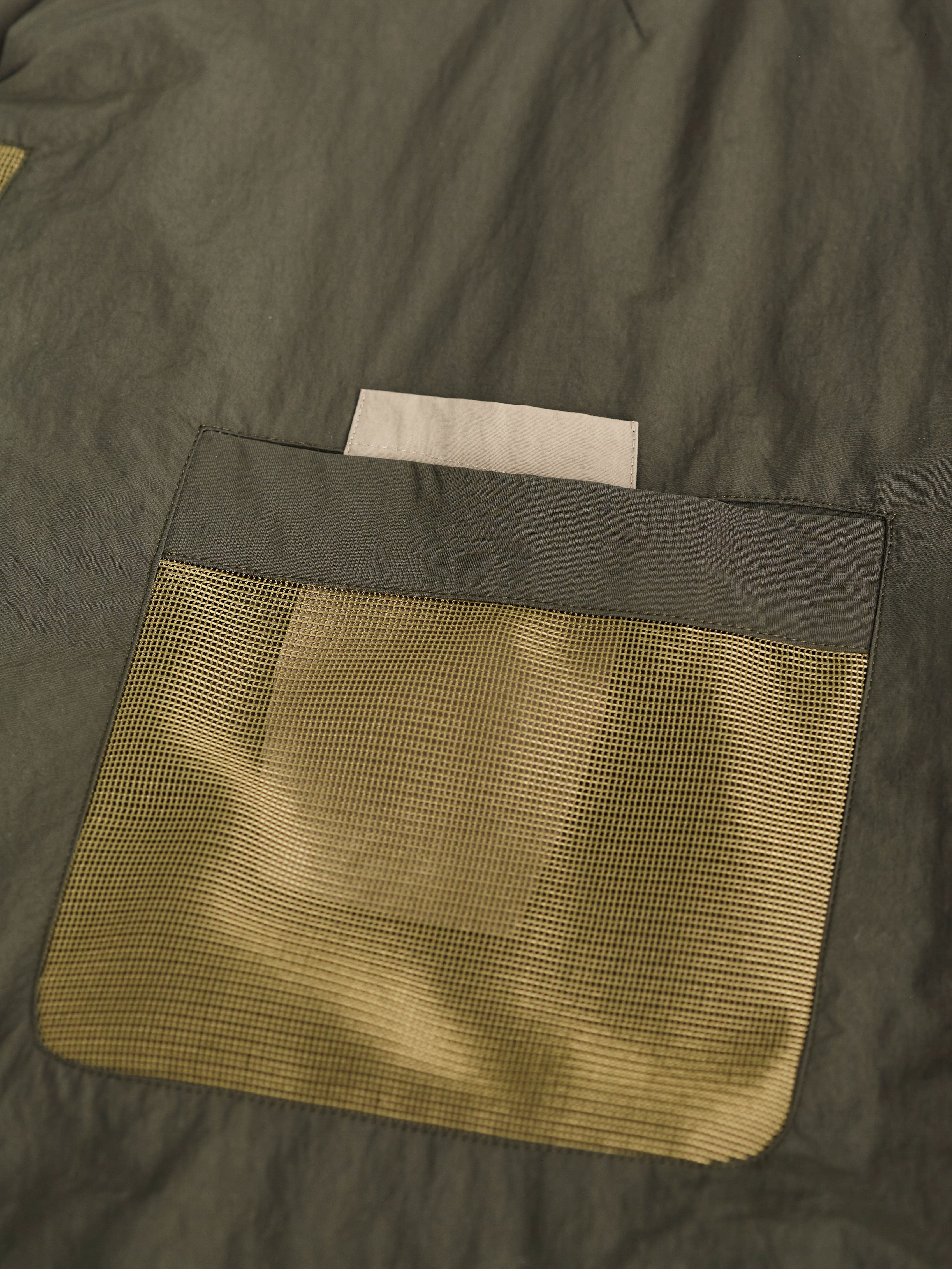 mesh pocket detail of puffer jacket