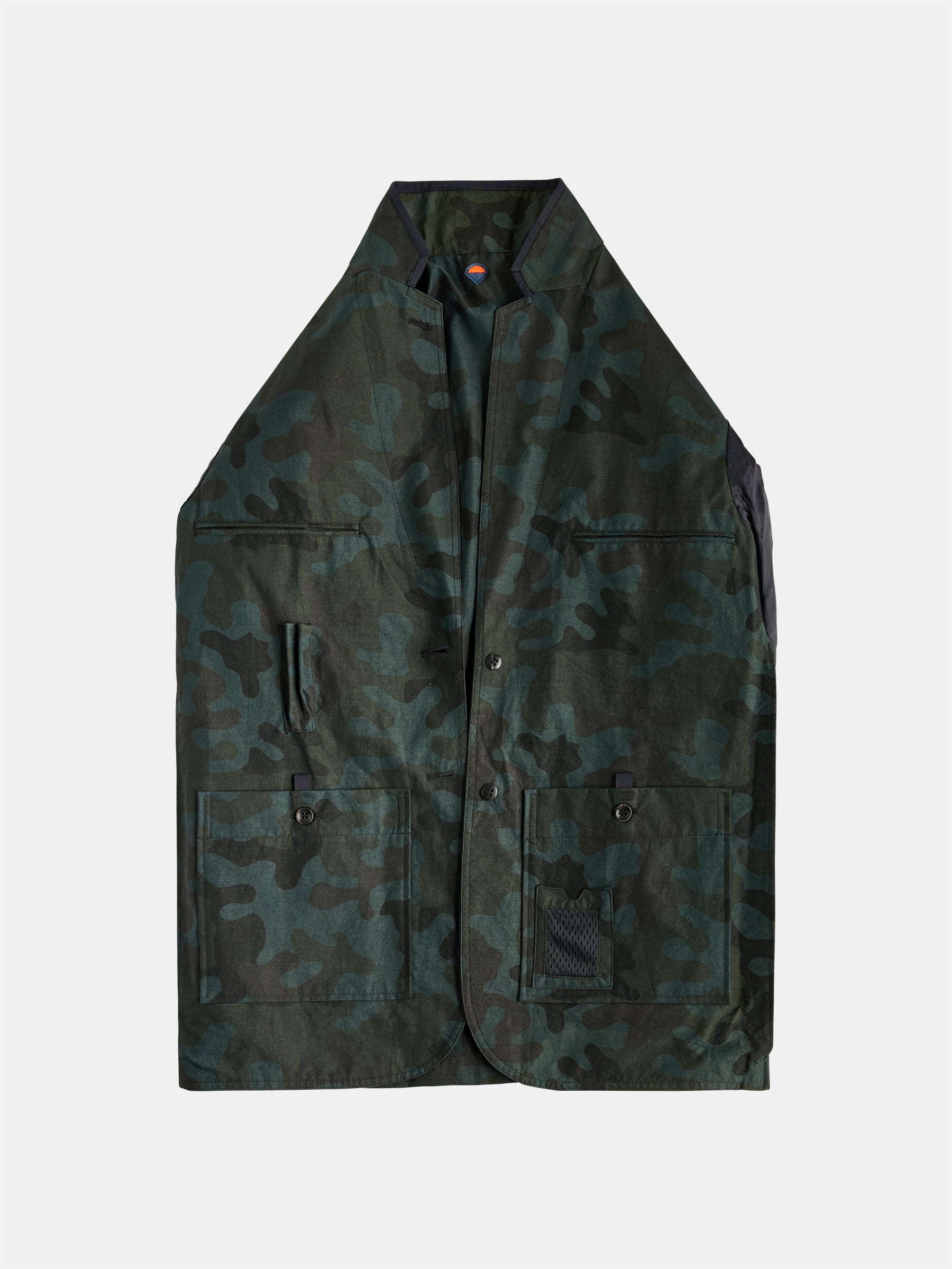 Introducing the POCKETPARACHUTE® Camouflage Jacket by gabrielstunz, a sleeveless vest designed with a button-up front and made from performance fabric for enhanced durability. It features multiple pockets, including one with a distinctive black netted patch, providing packable convenience. The jacket is showcased against a light grey backdrop.